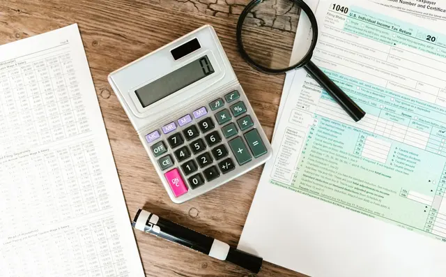 Bank statement and spreadsheet during reconciliation