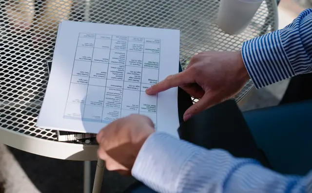 Project schedule being reviewed in a site office