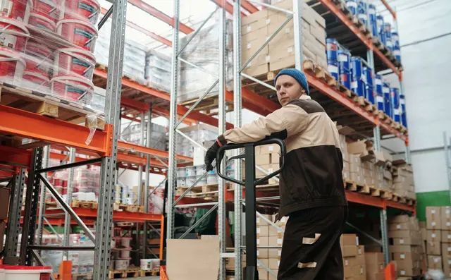 Pallets stacked inside a refrigerated cold store