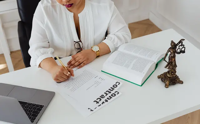 Open legal reference books on a desk