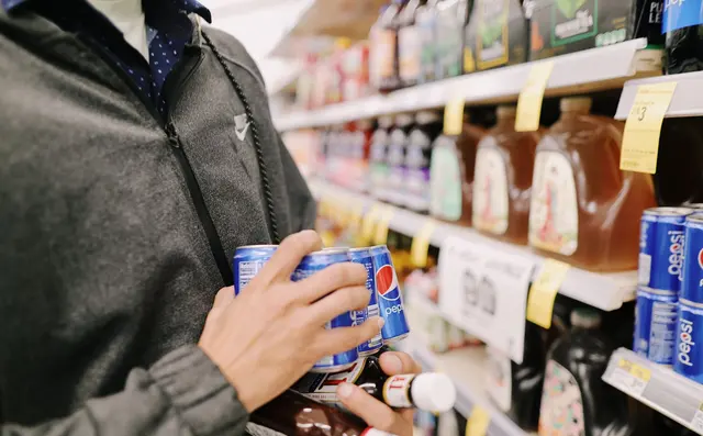 Shelf price labels in a supermarket aisle