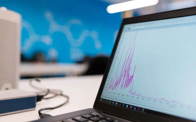 Model results plotted on a laptop screen
