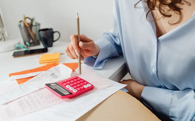Tariffs being checked at a desk